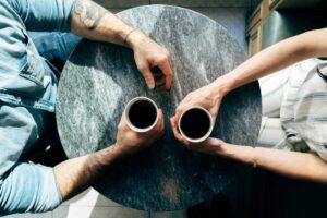 Supportive conversation between two people, highlighting the importance of listening and reaching out